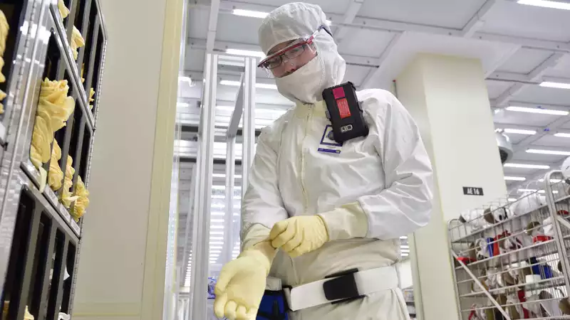 Intel is liquidating factory inventory to donate protective clothing to medical personnel.