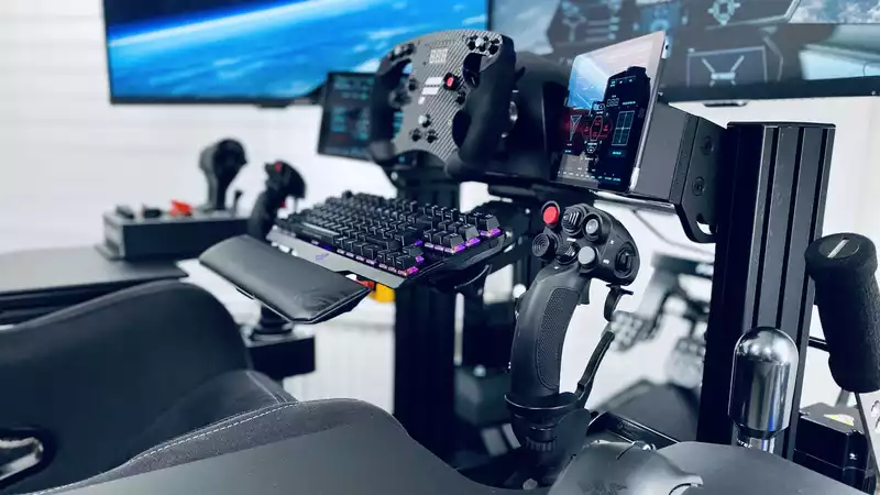 This gaming setup is the ultimate flight and racing sim battle station.