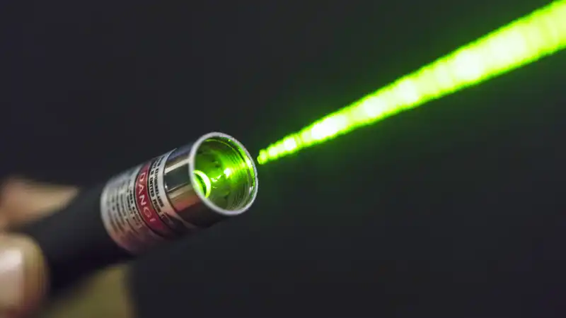 This 3D printed laser chip hacking device uses a $20 laser pointer and costs $500 to make.